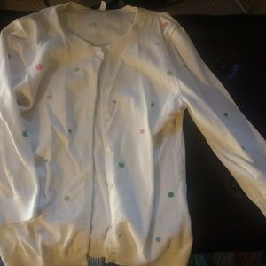 White cardigan with rainbow polka dots